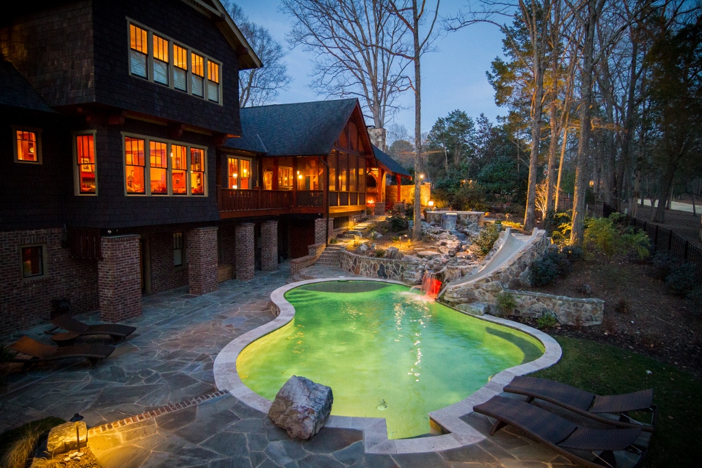 In ground pool with water slide