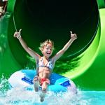 child on a pool slide