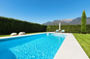 Modern villa with pool, view from the garden