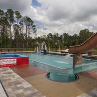 Corner of pool with hot tub and water slide